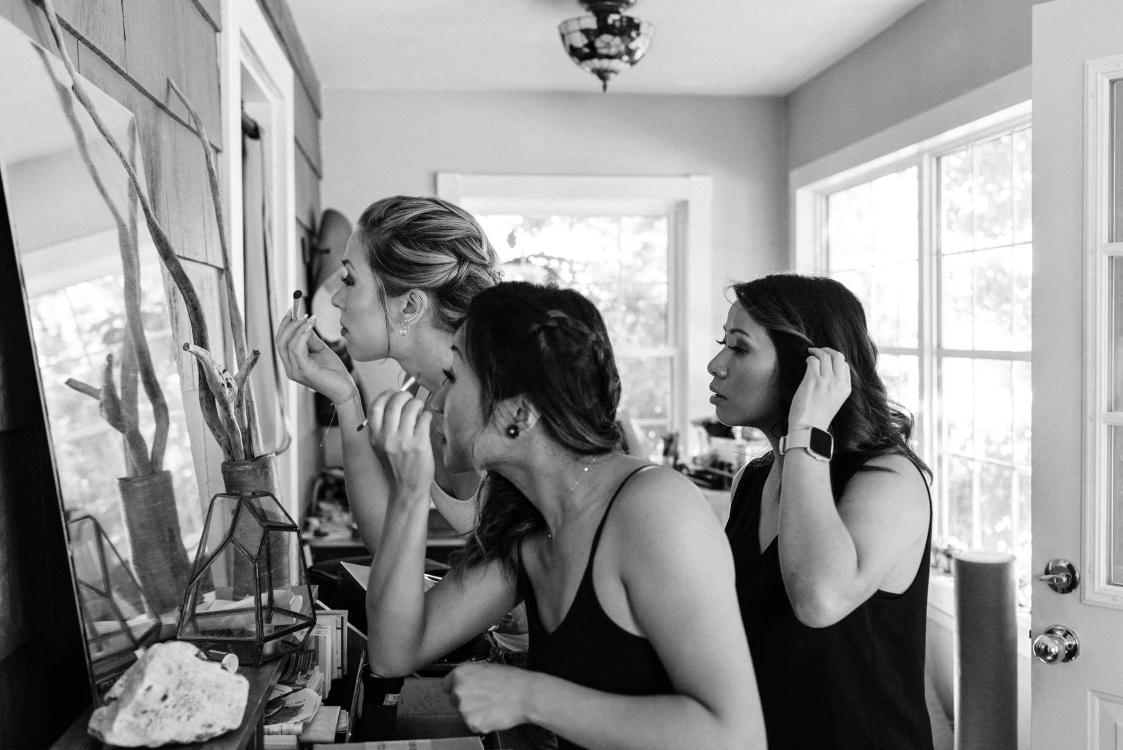 bridesmaids getting ready for wedding