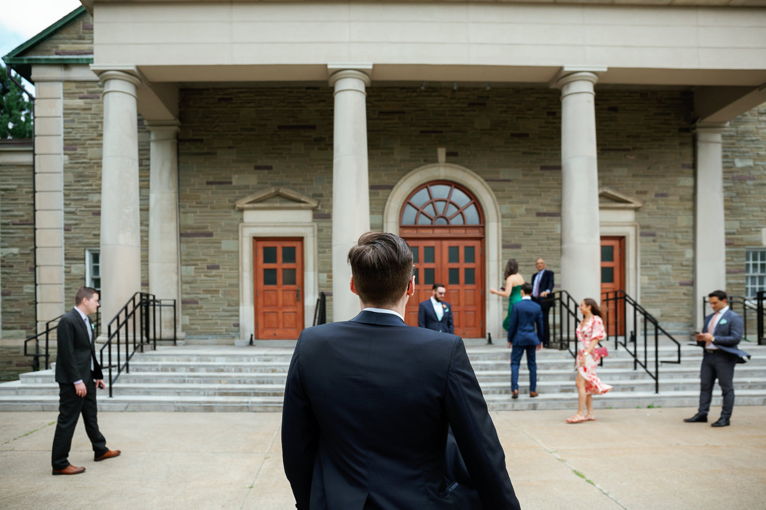 groom walking into church ceremony
