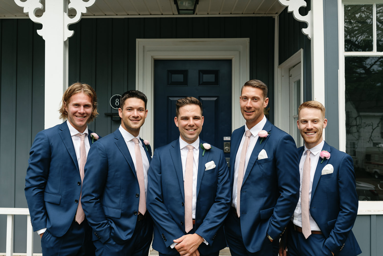 groomsmen pose for photo before wolfville wedding