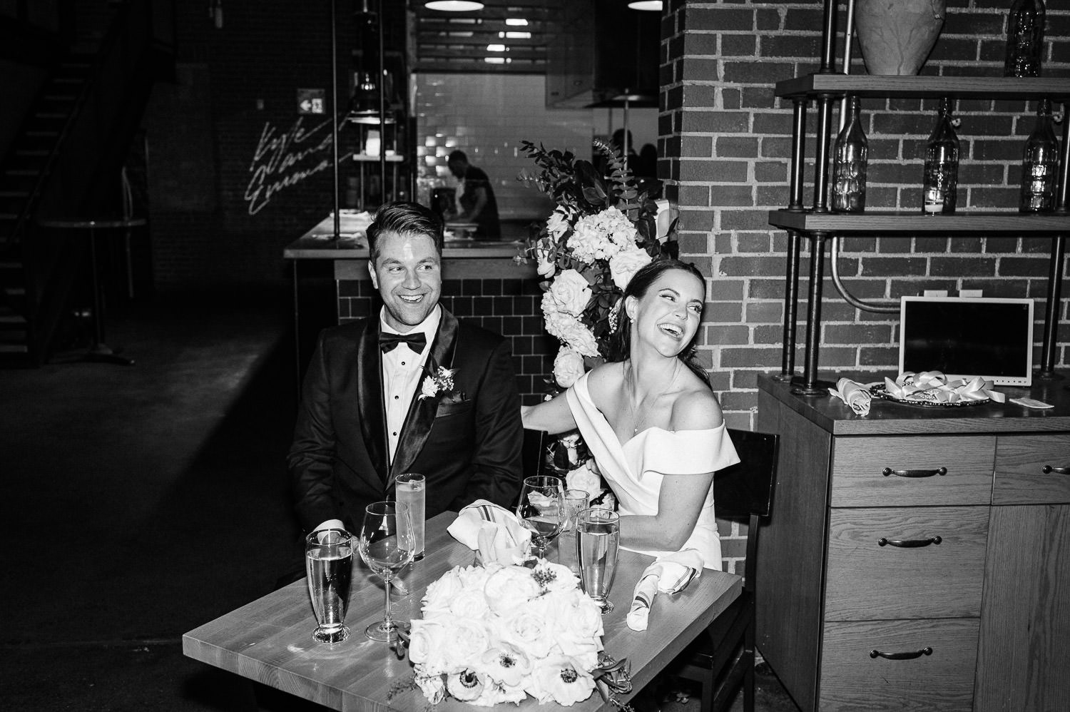 bride and groom celebrate at Agricola street brasserie