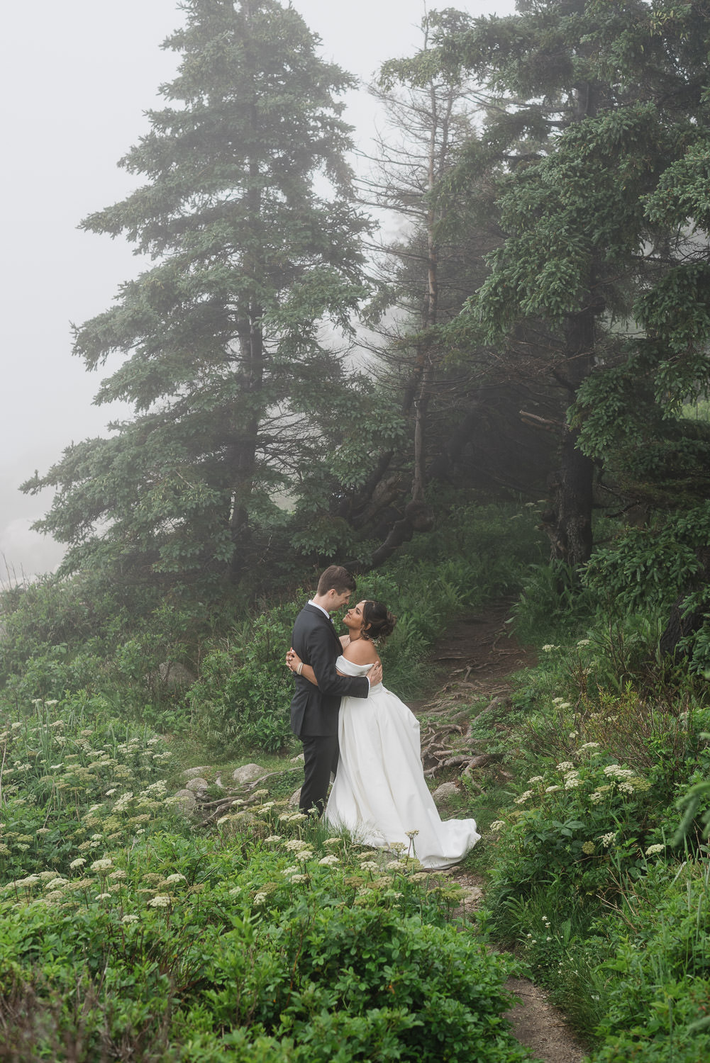 bride and groom laugh together on their stress-free wedding day