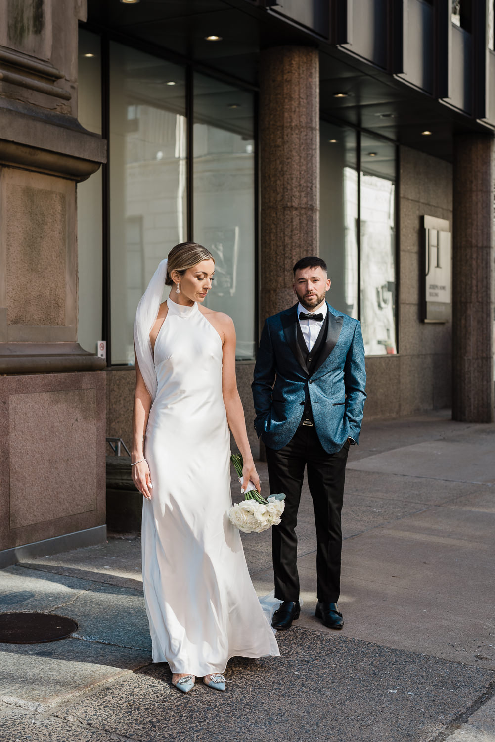 Stylish wedding couple pose for photo in Halifax