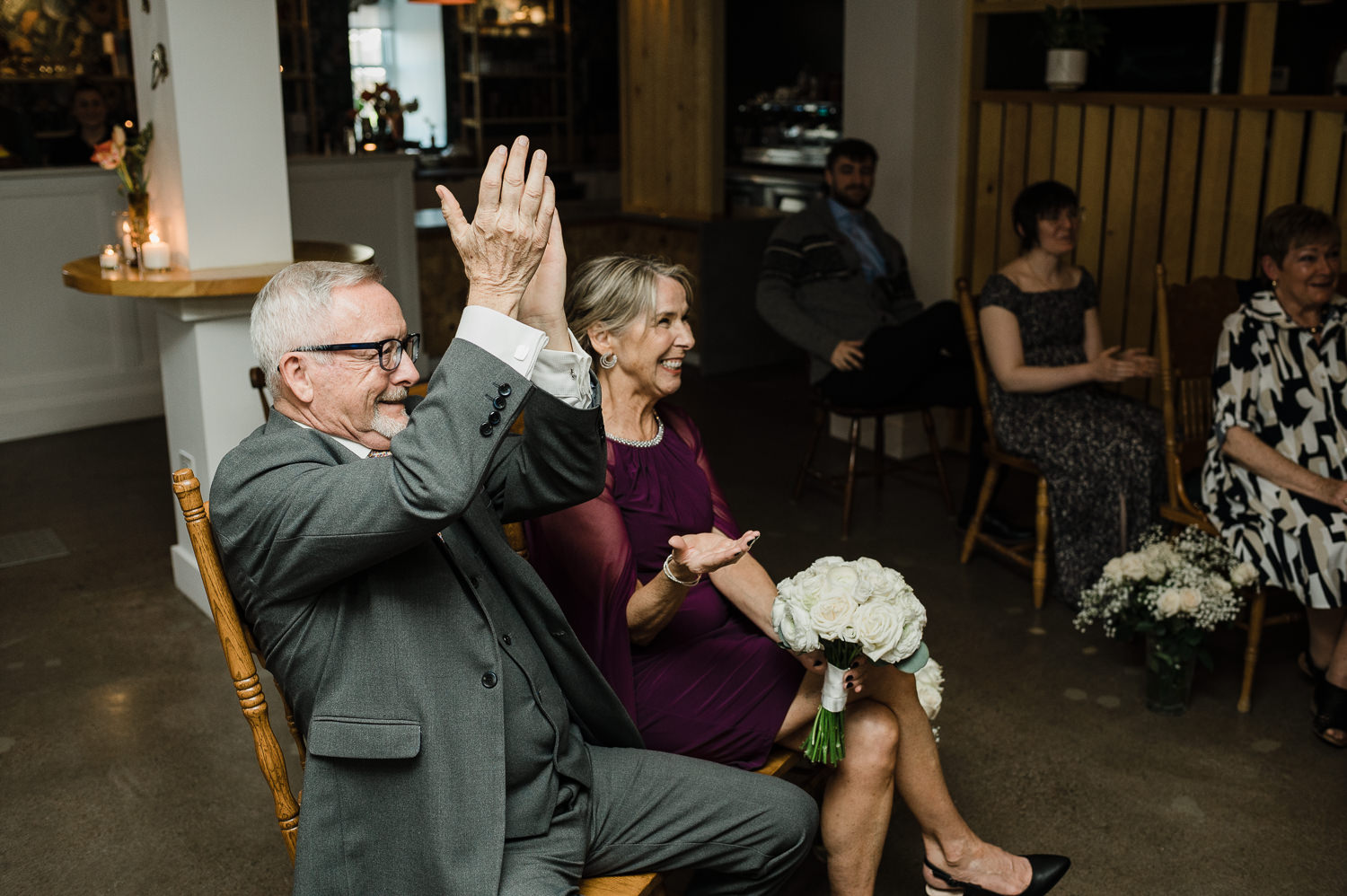 Family celebrates wedding couple just married at Anemone Dining