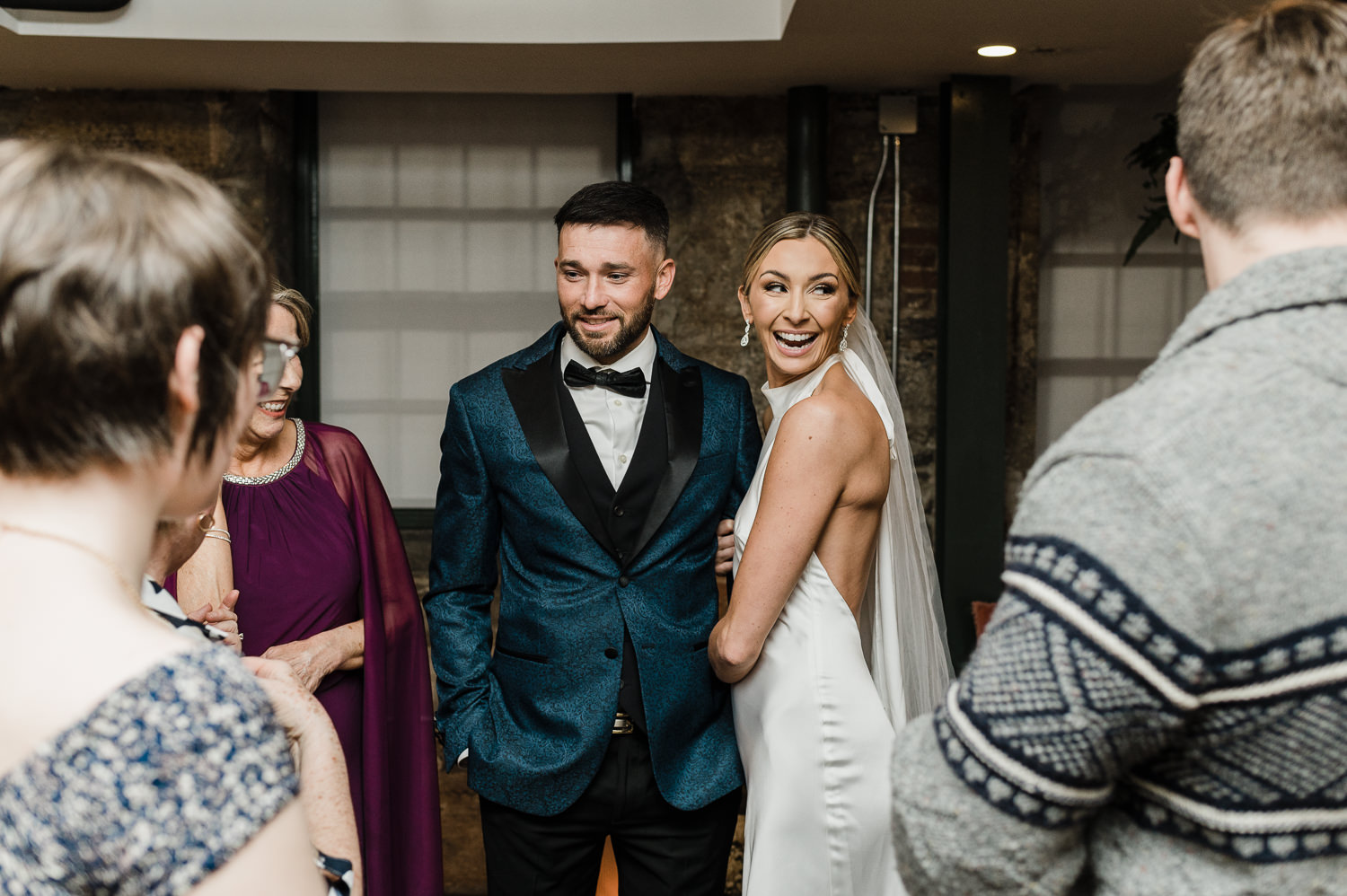 Family celebrates wedding couple just married at Anemone Dining