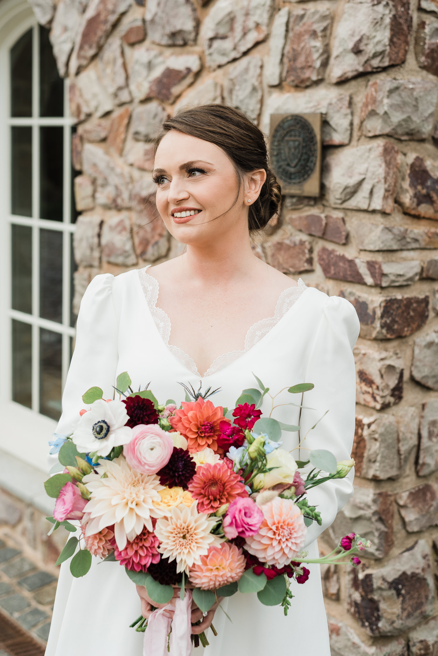 Bride holding flowers at Grand Pré Winery wedding