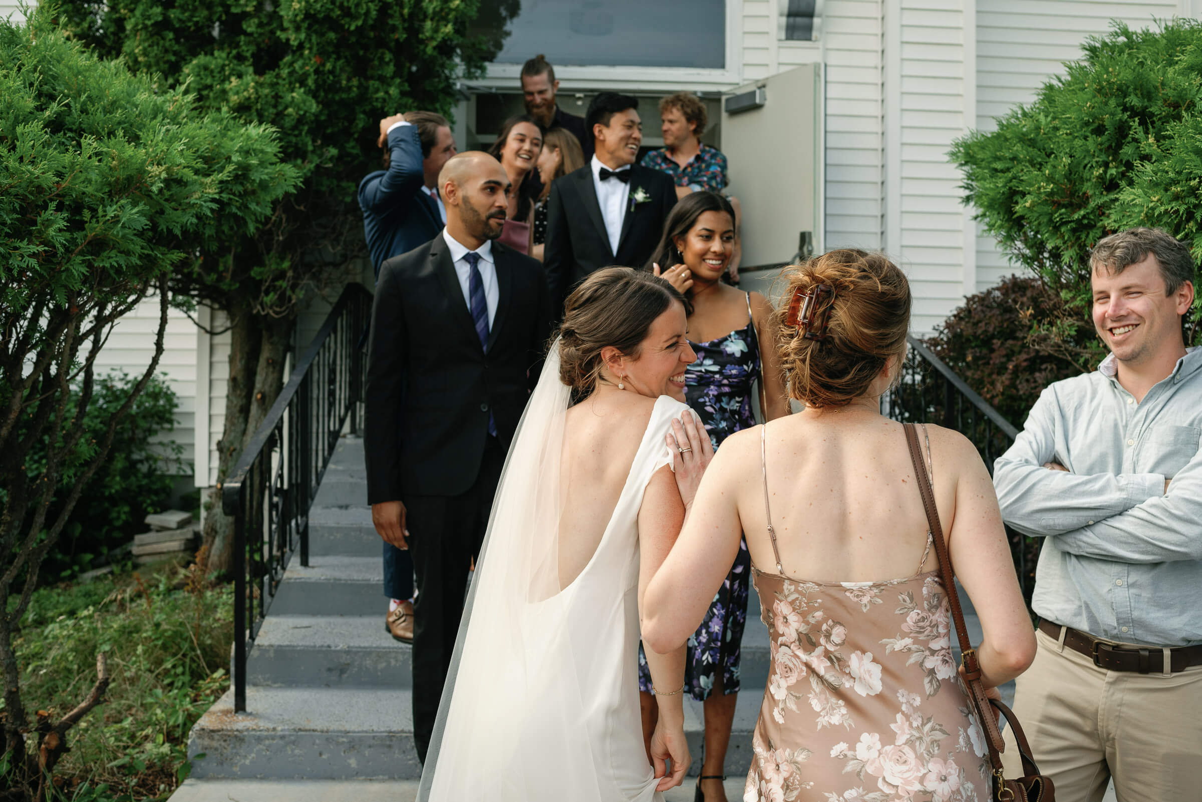 guests gather and celebrate outside church in new glasgow