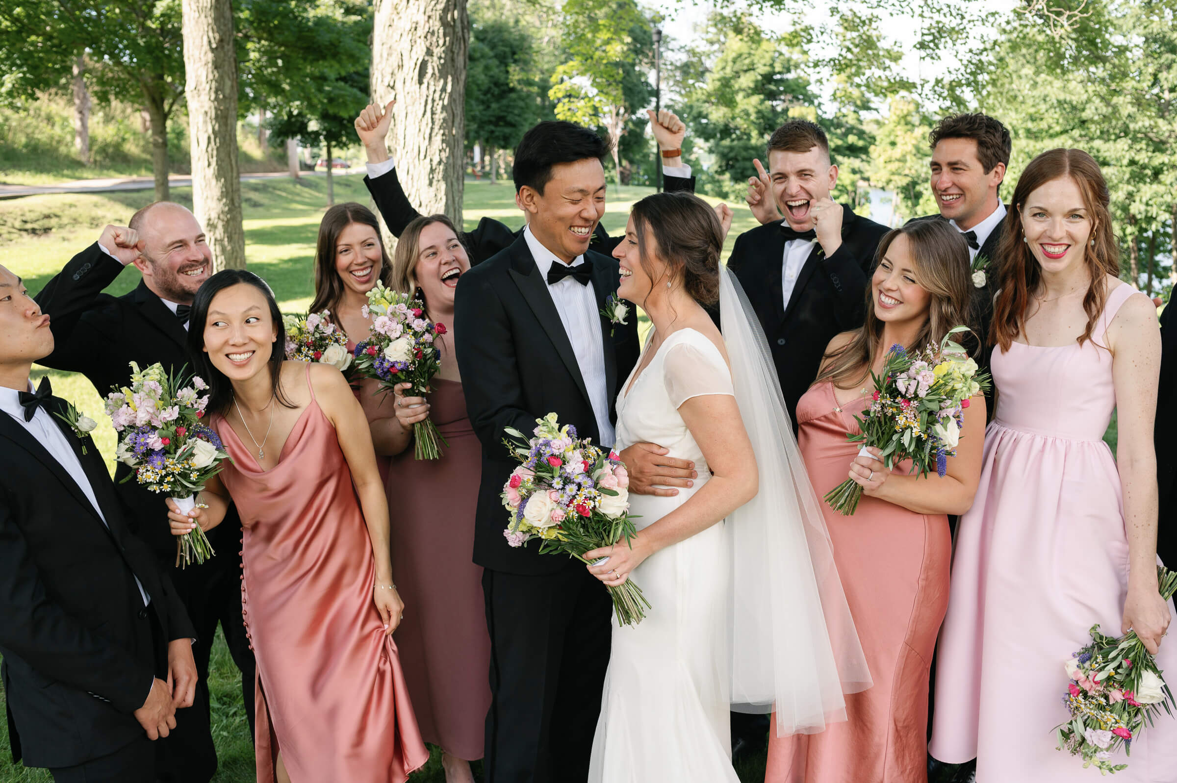 wedding party poses for photos in new glasgow park