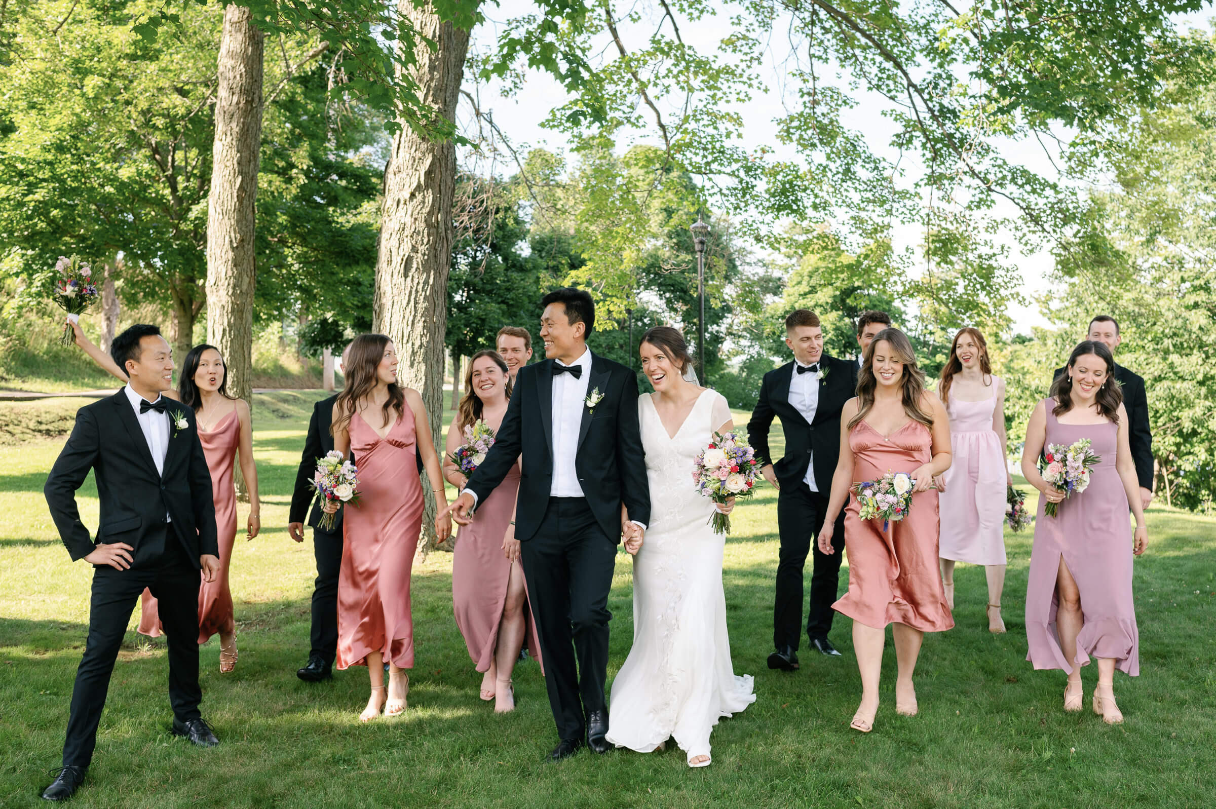 wedding party poses for photos in new glasgow park