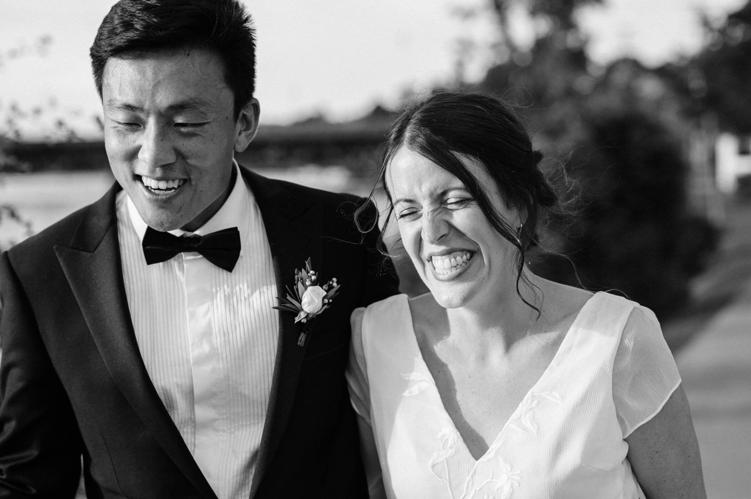 bride and groom pose for photos in new glasgow park