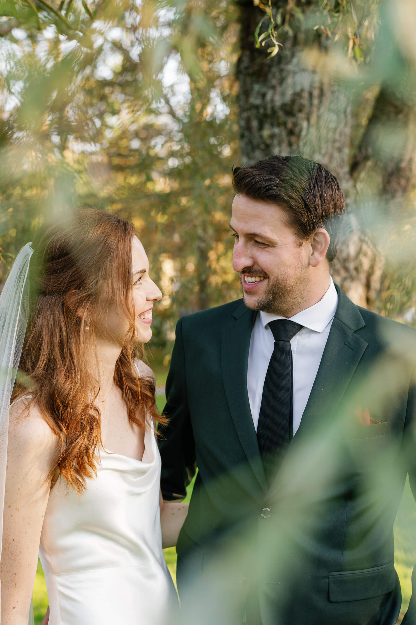 bride and groom smile for wedding portraits in halifax