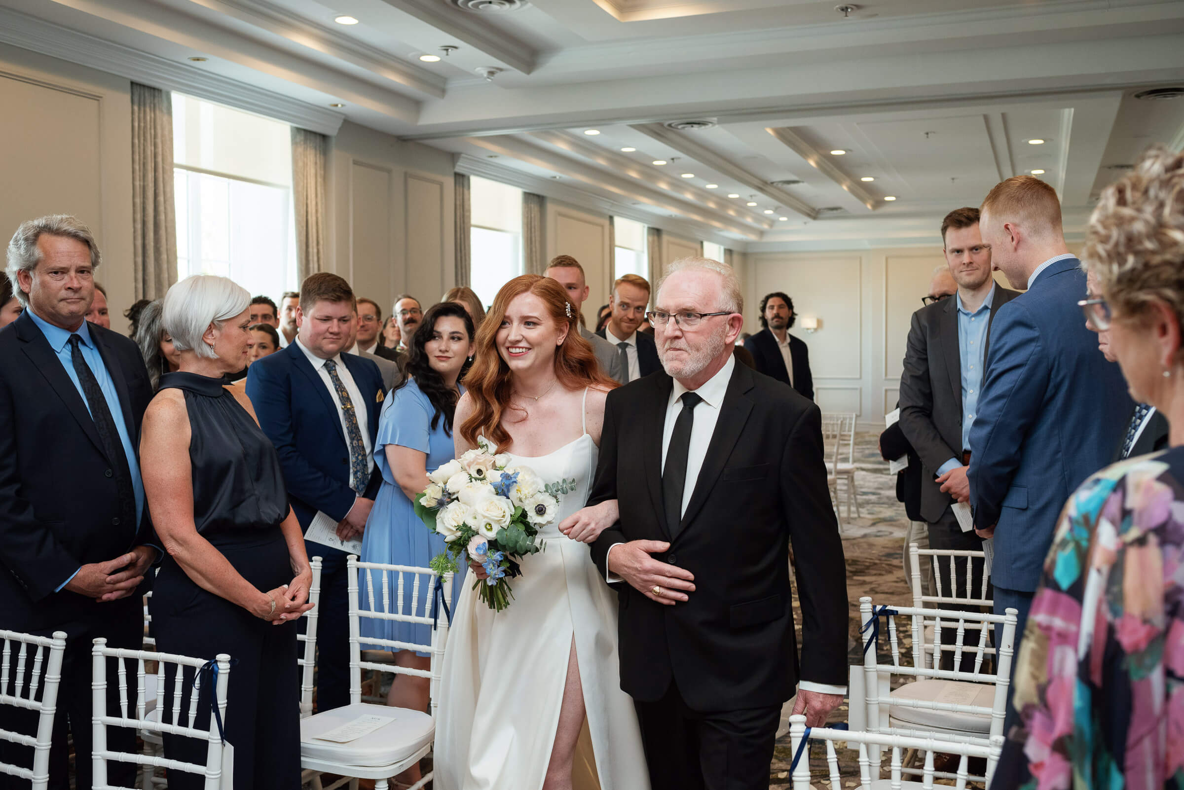 bride and father walk down the aisle of westin nova scotia wedding