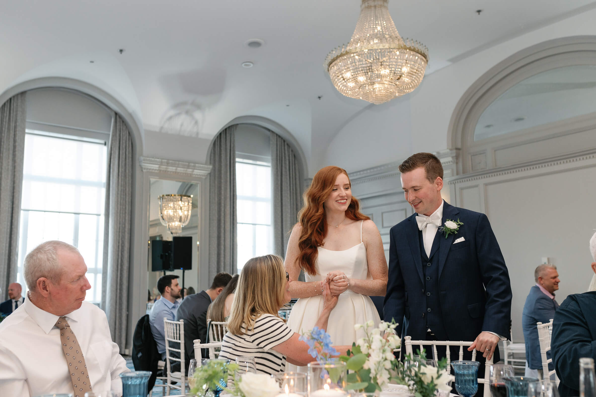 bride and groom chat with guests at westin nova scotia wedding